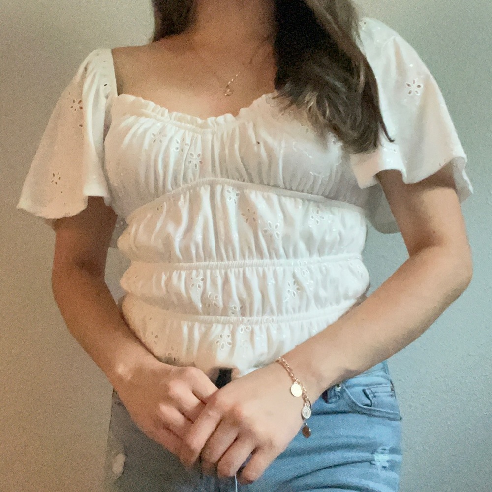 Juniors' SO® Eyelet Flutter Sleeve Smocked Top